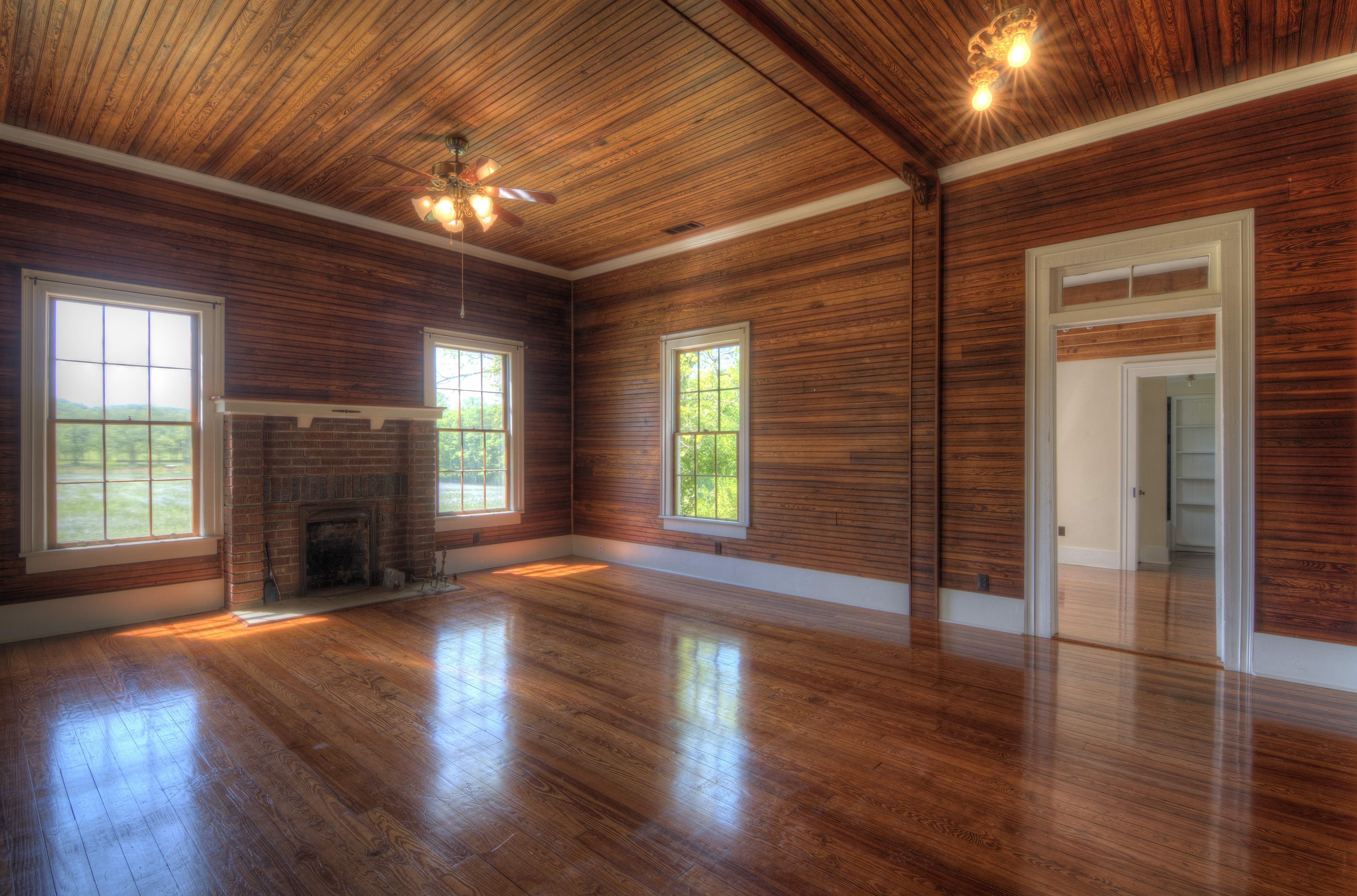 Wood Walls Living Room With Wooden Ceiling