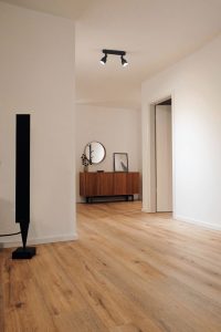 Engineered hardwood floors in a Colorado home, offering a cost-effective and durable alternative to solid hardwood floors with a similar aesthetic.